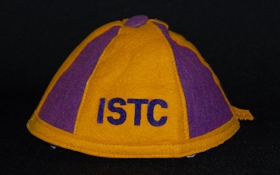 Iowa State Teacher's College beanie artifact from the UNI Museum.