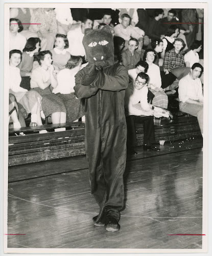 Black and white photo of the first panther mascot.